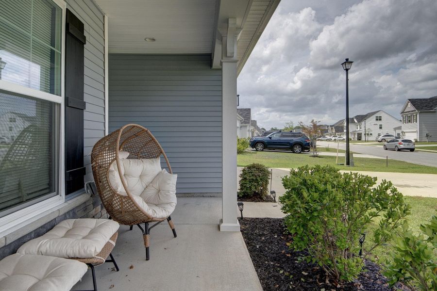 Exterior details and patio area of a home in Oakley Pointe, Moncks Corner (Image 28). Exterior details and patio area of a home in Oakley Pointe, Moncks Corner (Image 28).