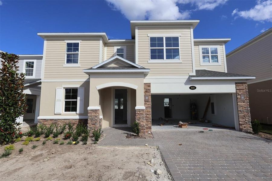 Exterior details and patio area of a home in Estates at Rivercrest, Sanford (Image 12). Exterior details and patio area of a home in Estates at Rivercrest, Sanford (Image 12).