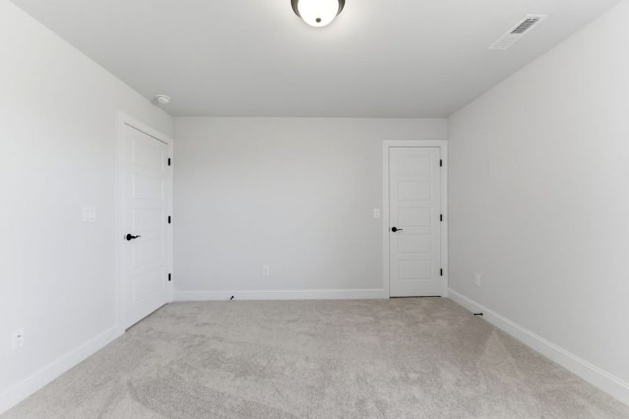 Spacious, unfurnished interior of a new home in Blacksmith, Stokesdale (Image 87).