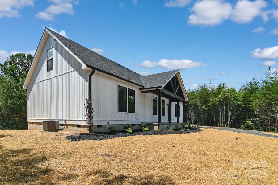 Front exterior of a new home in , Morganton, NC, highlighting curb appeal (Image 21).
