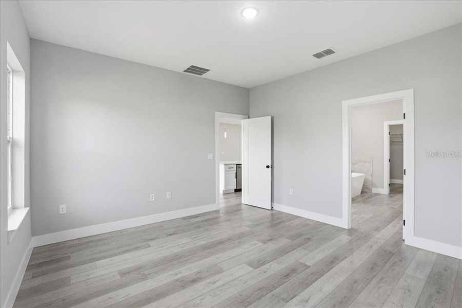 Spacious, unfurnished interior of a new home in , Port Charlotte (Image 39).
