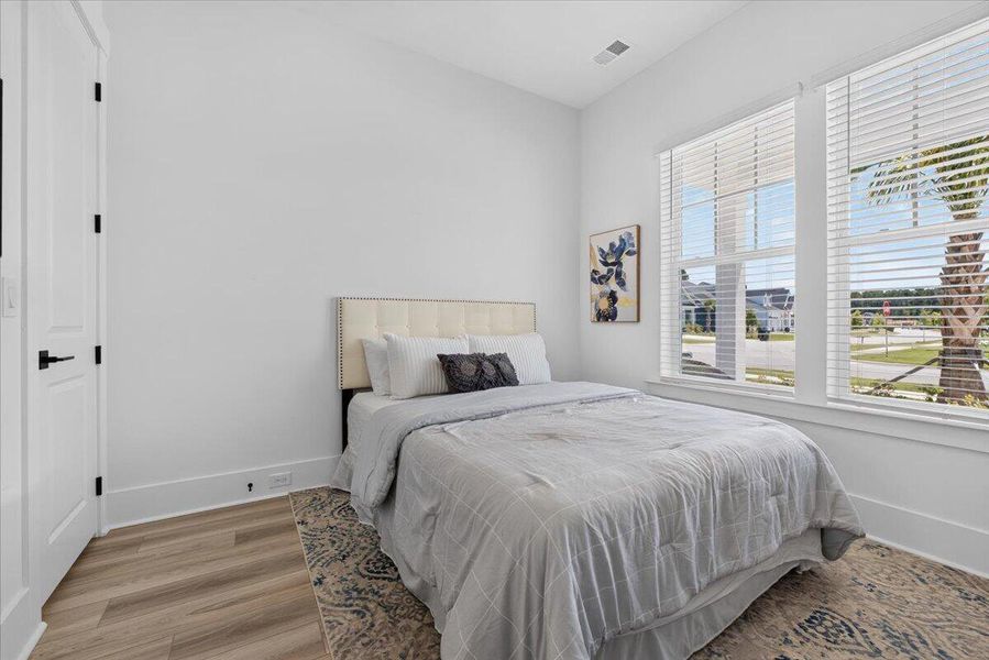 Furnished interior view inside a new home in Summerwind Crossing at Lakes of Cane Bay, Summerville (Image 11).