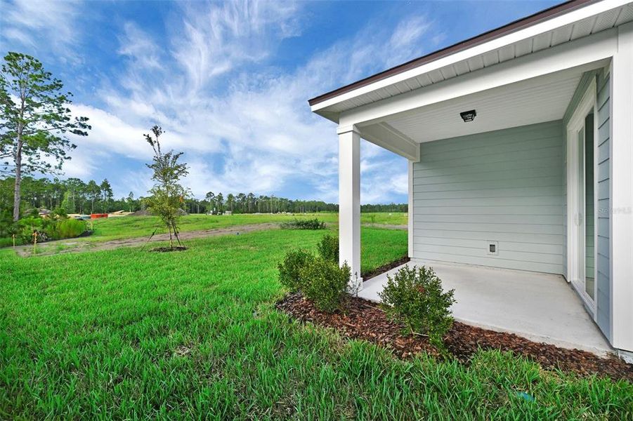 Exterior details and patio area of a home in Seminole Palms, Palm Coast (Image 3).