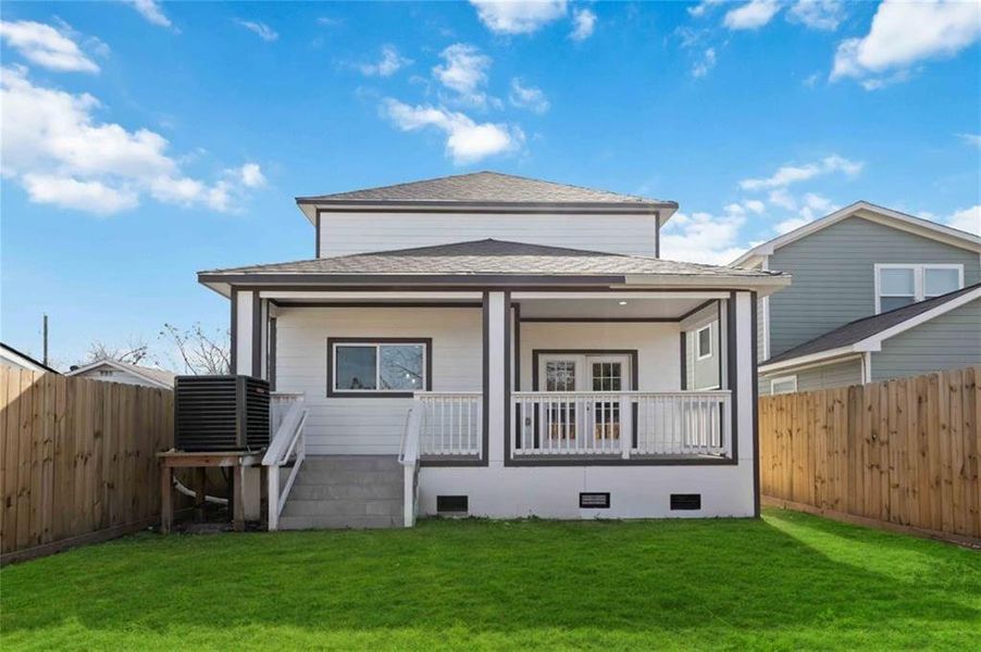 Fenced in backyard patio.