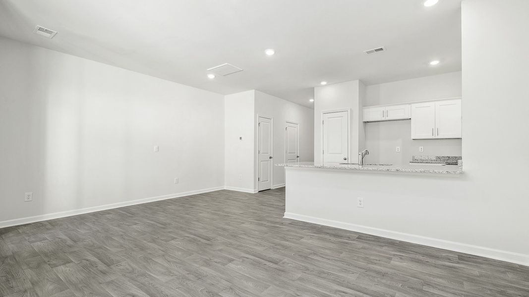 Spacious, unfurnished interior of a new home in North Village Townes, Greensboro (Image 9).