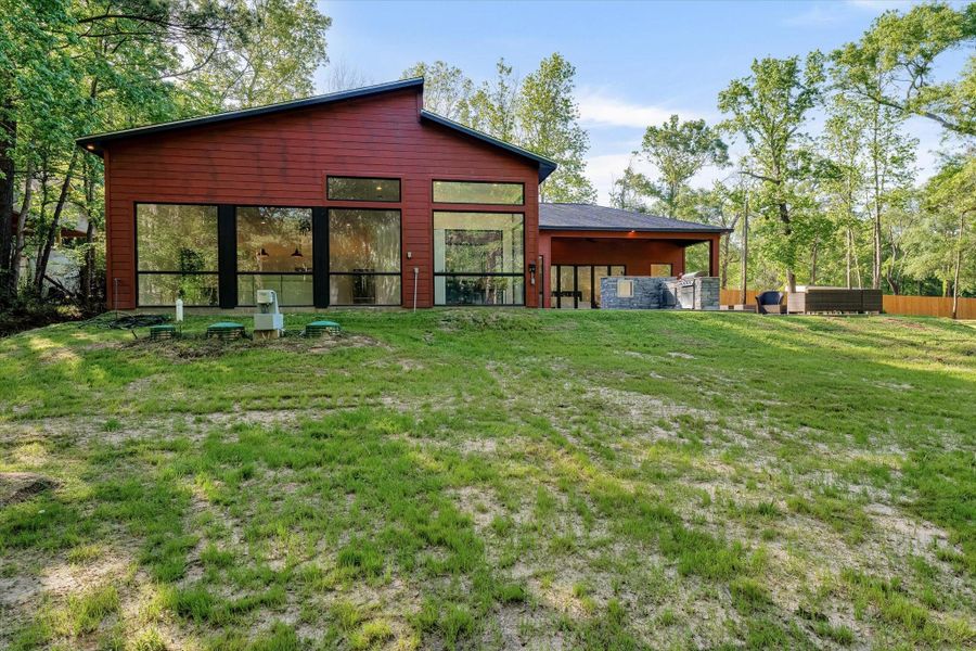Front exterior of a new home in , Conroe, TX, highlighting curb appeal (Image 21). Front exterior of a new home in , Conroe, TX, highlighting curb appeal (Image 21).