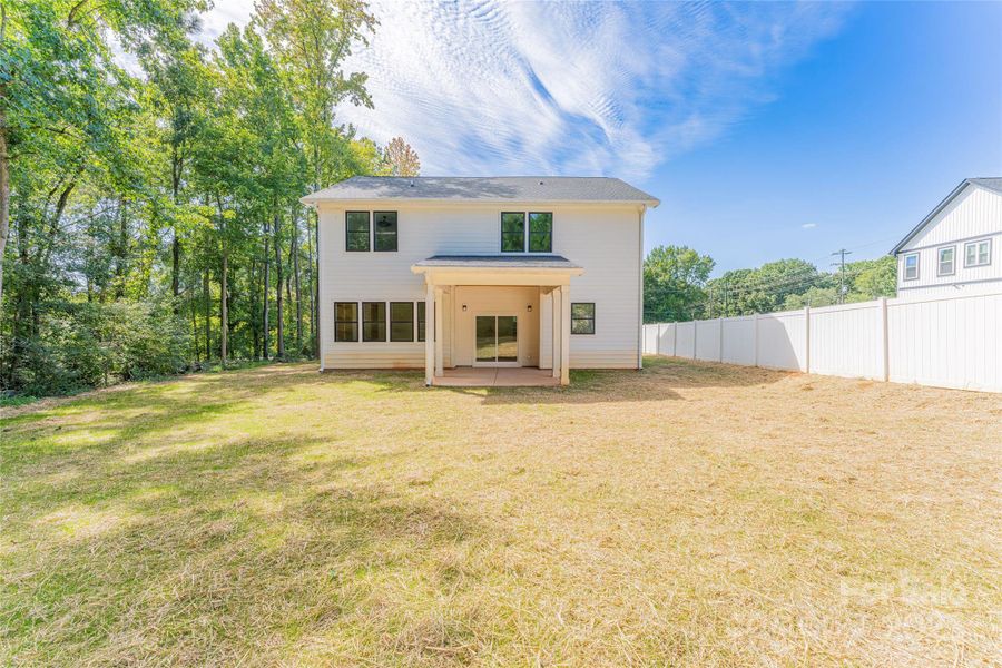 Front exterior of a new home in , Charlotte, NC, highlighting curb appeal (Image 19). Front exterior of a new home in , Charlotte, NC, highlighting curb appeal (Image 19).