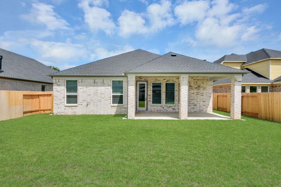 Explore the expansive backyard with its inviting covered patio—a perfect blend of space for the kids to play and adults to unwind. Ideal for creating your outdoor oasis, this backyard accommodates patio furniture, a BBQ pit, and endless possibilities for leisure and entertainment.