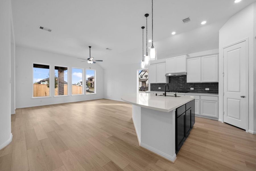 Furnished interior view inside a new home in Bridgeland, Cypress (Image 10).