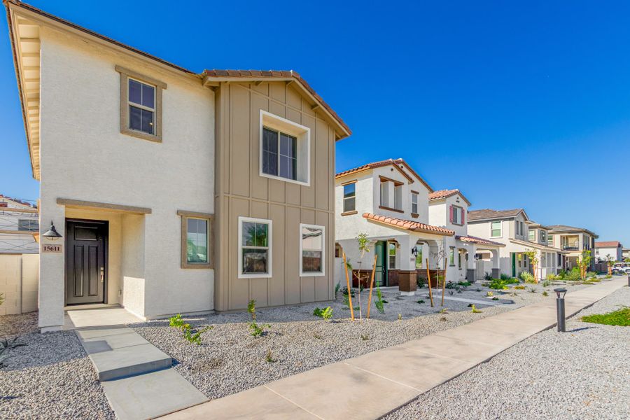 Front exterior of a new home in Solvida at Estrella, Goodyear, AZ, highlighting curb appeal (Image 2).