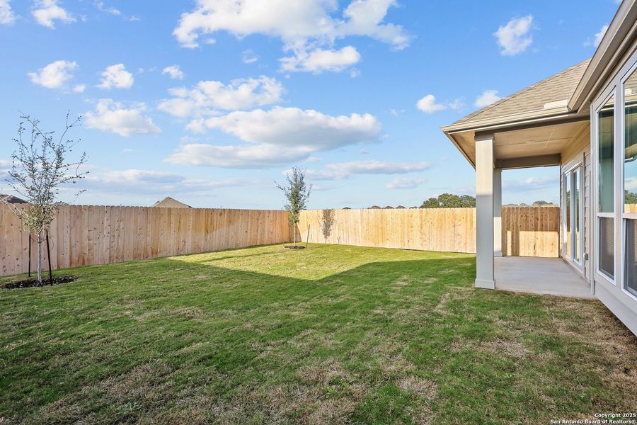 Exterior details and patio area of a home in Sunflower Ridge, New Braunfels (Image 22).