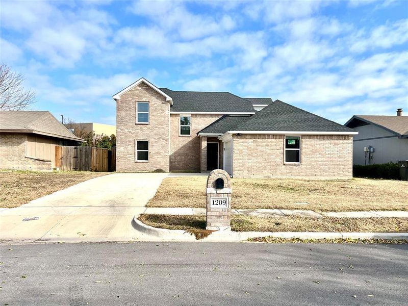 Front exterior of a new home in , Garland, TX, highlighting curb appeal (Image 1). Front exterior of a new home in , Garland, TX, highlighting curb appeal (Image 1).