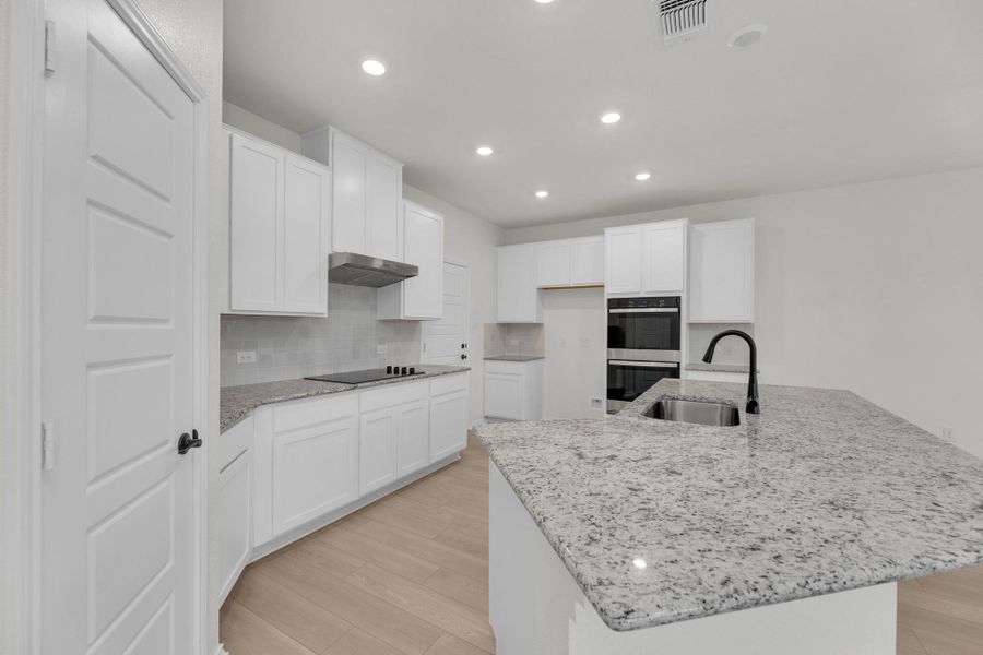 Furnished interior view inside a new home in Overlook Ranch, Georgetown (Image 16).