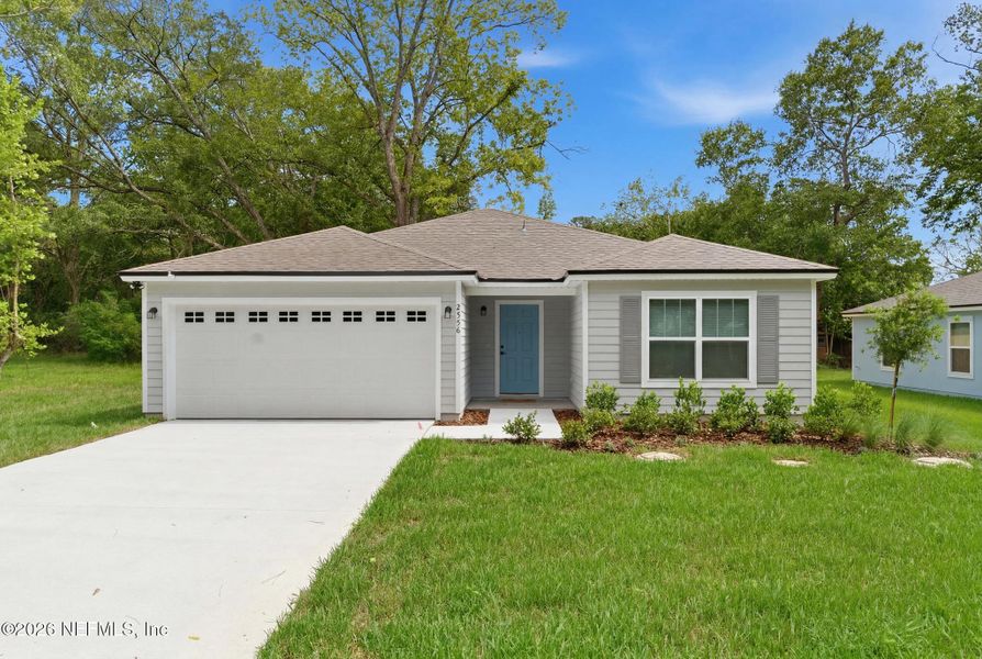 Front exterior of a new home in , Jacksonville, FL, highlighting curb appeal (Image 1). Front exterior of a new home in , Jacksonville, FL, highlighting curb appeal (Image 1).
