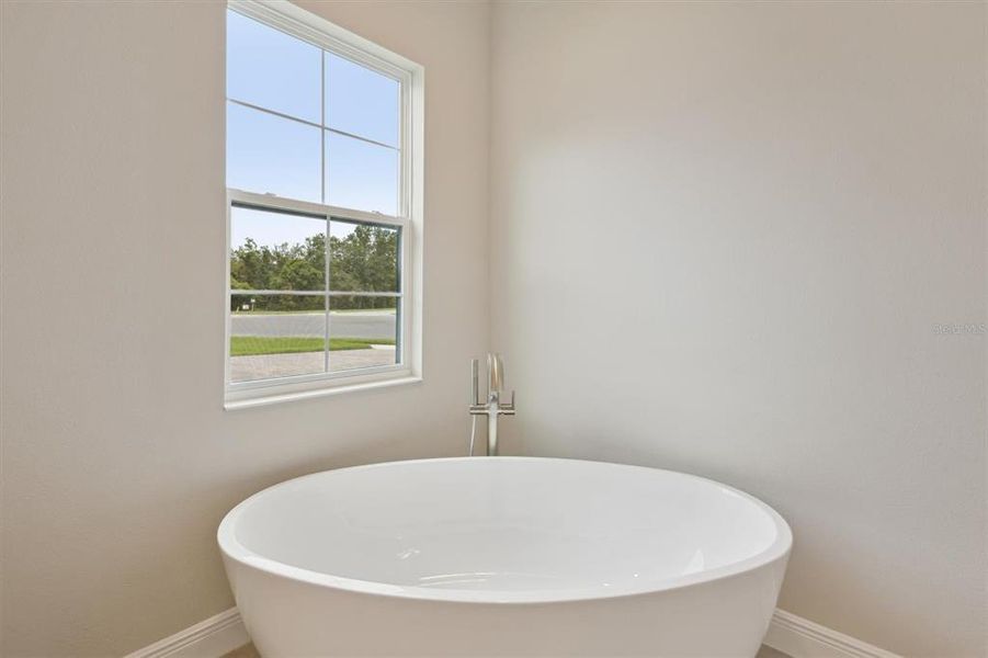 Furnished interior view inside a new home in Hidden Lakes, Brandon (Image 12).