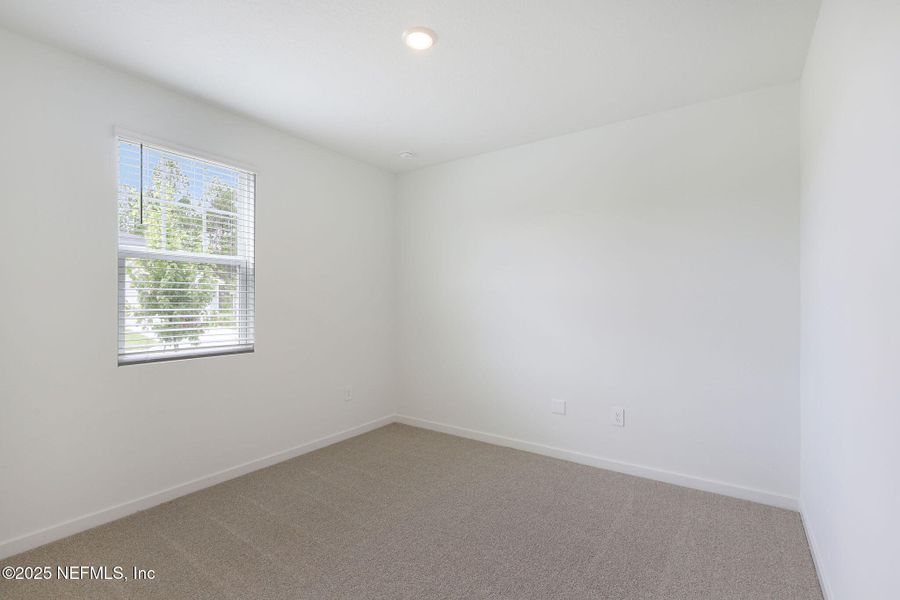 Spacious, unfurnished interior of a new home in Lakes at Bella Lago - Signature Series, Green Cove Springs (Image 19).