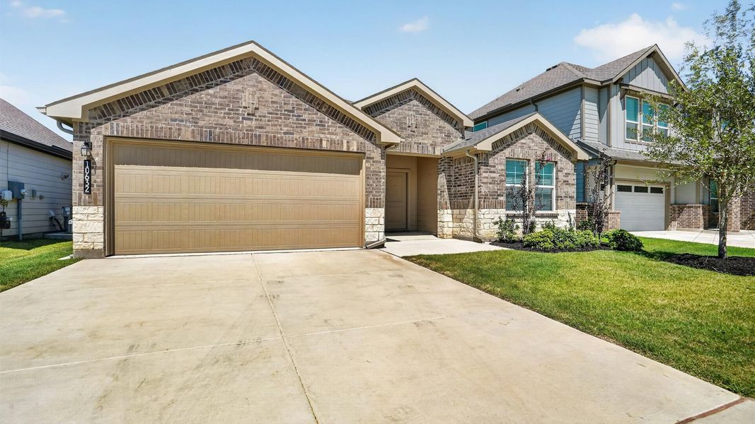 Representative exterior photo of a completed home built from the Dove by D.R. Horton in Rock Creek West, Fort Worth, TX (Image 21).