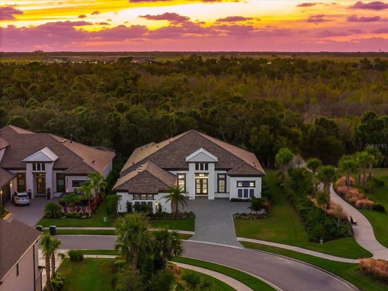 Front exterior of a new home in , Sarasota, FL, highlighting curb appeal (Image 25). Front exterior of a new home in , Sarasota, FL, highlighting curb appeal (Image 25).