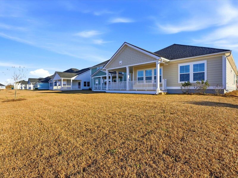 Exterior details and patio area of a home in The Coves at Lakes of Cane Bay, Summerville (Image 30). Exterior details and patio area of a home in The Coves at Lakes of Cane Bay, Summerville (Image 30).