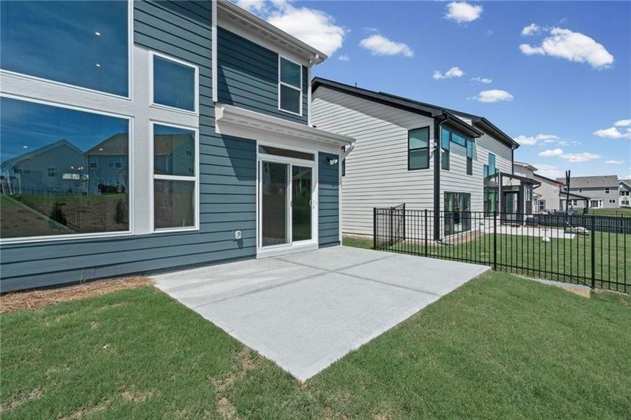 Exterior details and patio area of a home in Twin Lakes, Hoschton (Image 25).