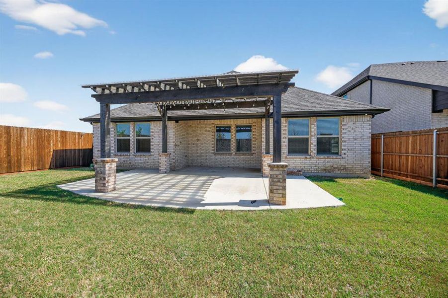 Exterior details and patio area of a home in Valencia on the Lake, Little Elm (Image 3). Exterior details and patio area of a home in Valencia on the Lake, Little Elm (Image 3).