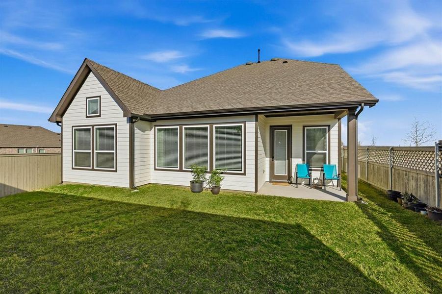 Exterior details and patio area of a home in Pecan Square - Gardens, Northlake (Image 24). Exterior details and patio area of a home in Pecan Square - Gardens, Northlake (Image 24).