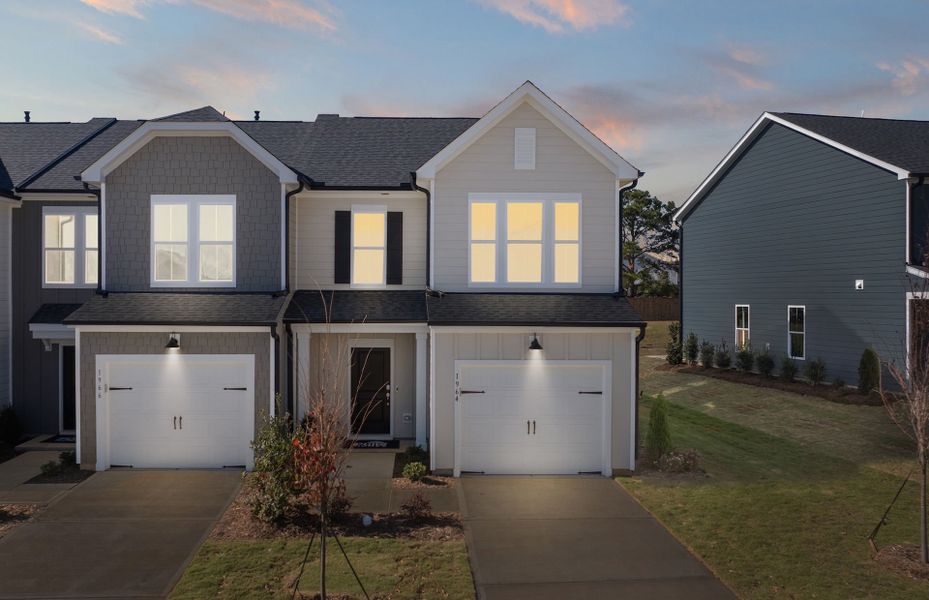Front exterior of a new home in Saunders Farm, Willow Spring, NC, highlighting curb appeal (Image 1).