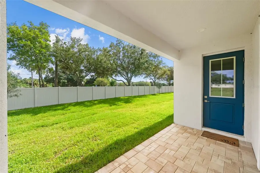 Exterior details and patio area of a home in , Tarpon Springs (Image 30).
