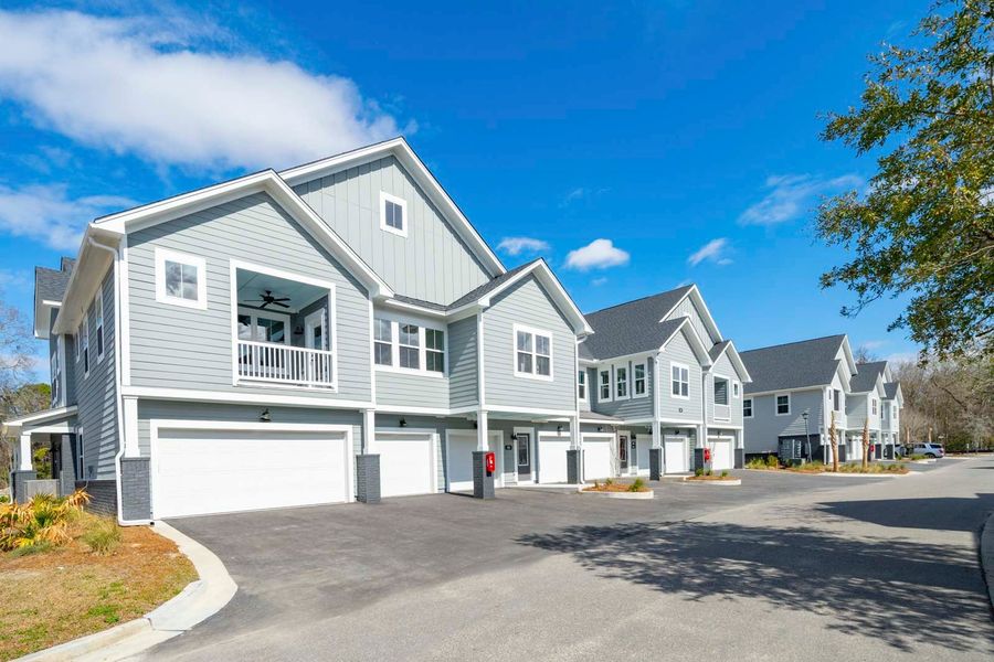 Representative exterior photo of a completed home built from the The Anson by New Leaf Builders in Middleborough Condos at Shadowmoss, Charleston, SC (Image 9).