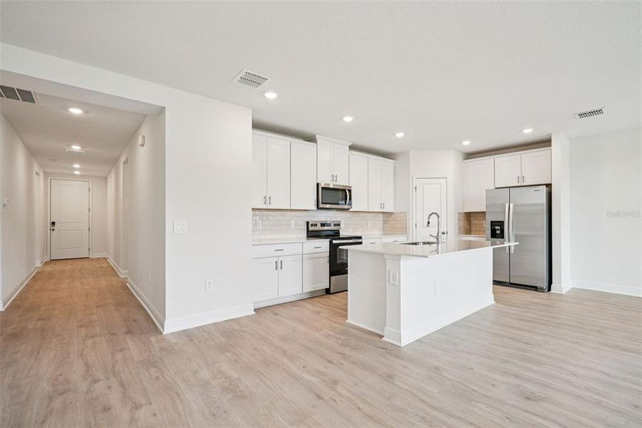 Furnished interior view inside a new home in The Reserve at Hammock Oaks - Signature Series, Lady Lake (Image 4).