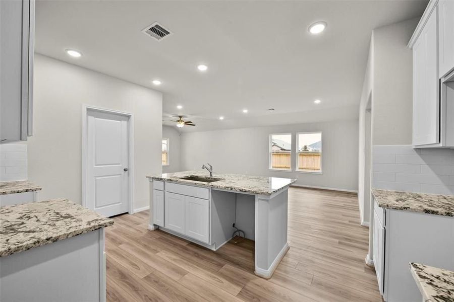 Furnished interior view inside a new home in Sunterra, Katy (Image 18). Furnished interior view inside a new home in Sunterra, Katy (Image 18).