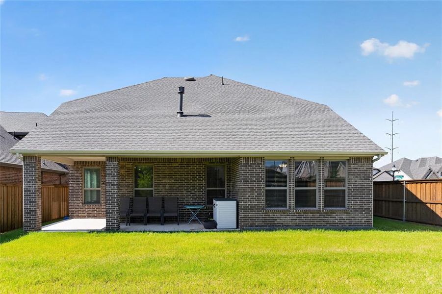 Exterior details and patio area of a home in , Little Elm (Image 24). Exterior details and patio area of a home in , Little Elm (Image 24).