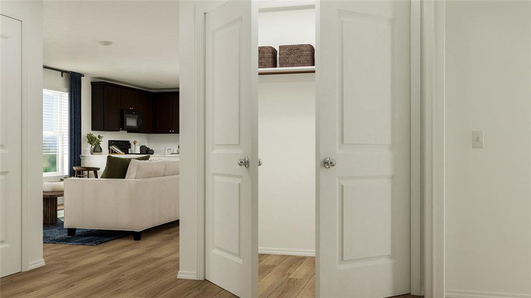 Hallway featuring light hardwood / wood-style flooring