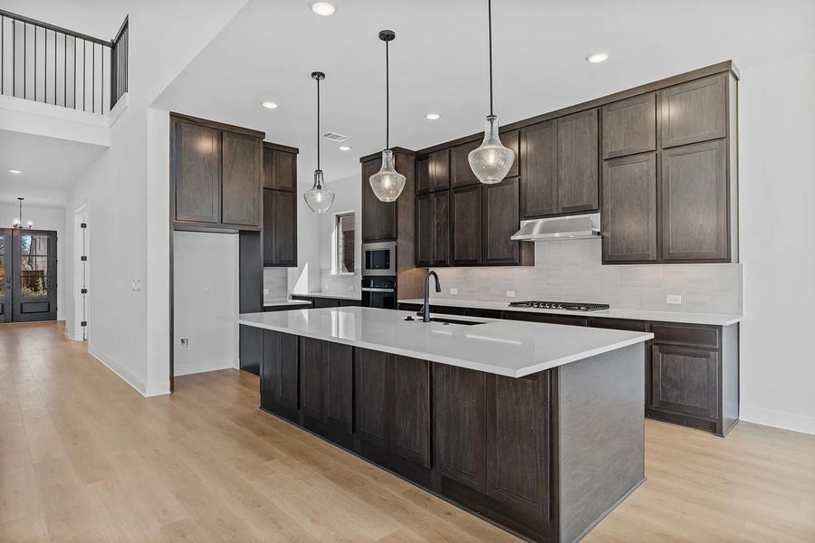 Furnished interior view inside a new home in Parmer Ranch 60, Georgetown (Image 10).