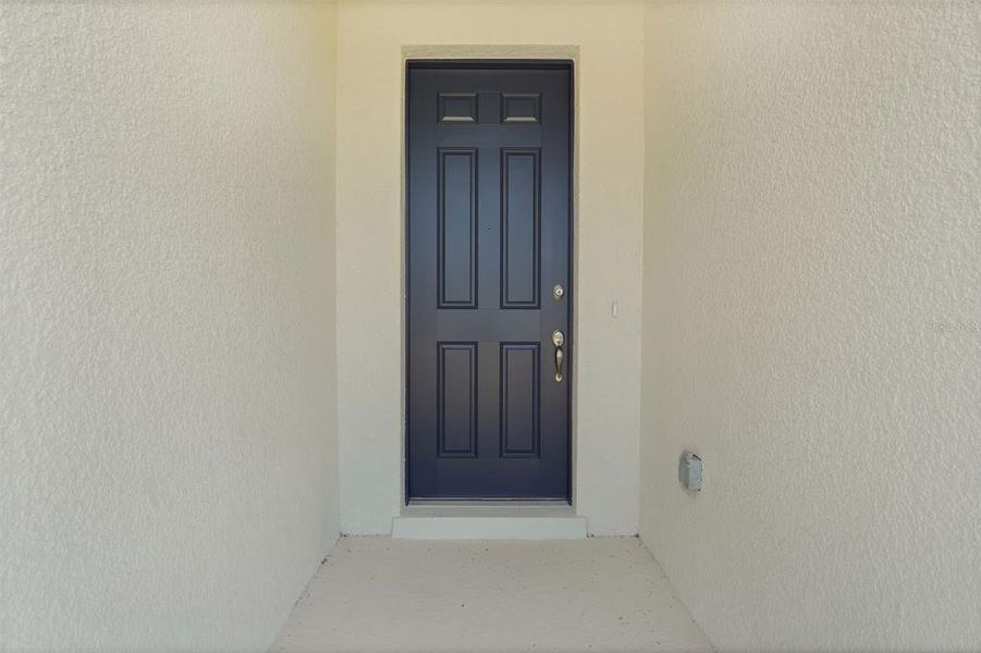 Exterior details and patio area of a home in Willowbrook North, Winter Haven (Image 23).