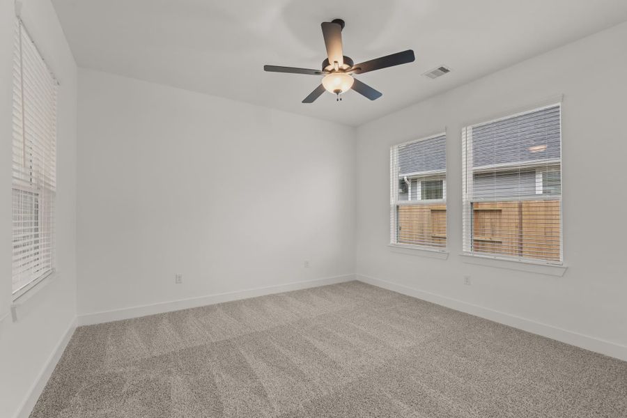 Representative unfurnished interior of a home built from the Sorenstam by Chesmar Homes in Riceland Alley Loads, Mont Belvieu (Image 72).