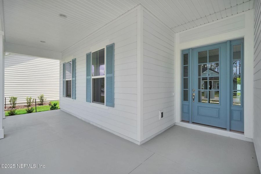 Exterior details and patio area of a home in Forest Park at Wildlight, Yulee (Image 3).