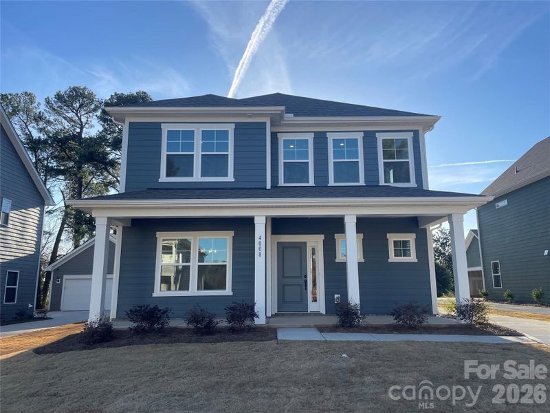 Front exterior of a new home in Arbor Village, Matthews, NC, highlighting curb appeal (Image 24).