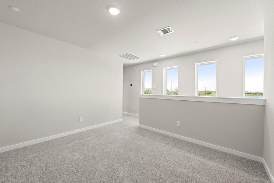 Upstairs GameRoom/Loft makes it easy to unwind from the day.