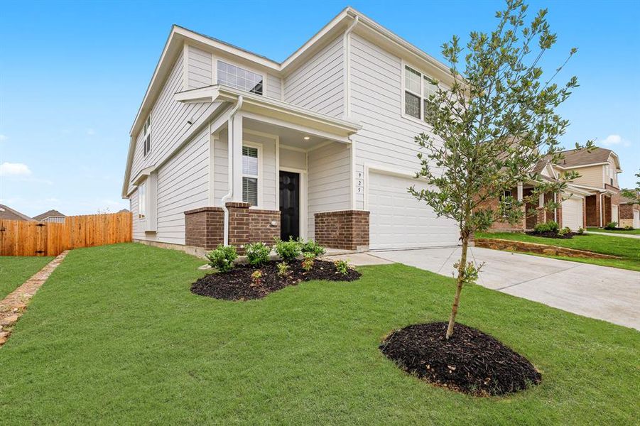 Front exterior of a new home in Retreat at Fossil Creek, Fort Worth, TX, highlighting curb appeal (Image 12). Front exterior of a new home in Retreat at Fossil Creek, Fort Worth, TX, highlighting curb appeal (Image 12).