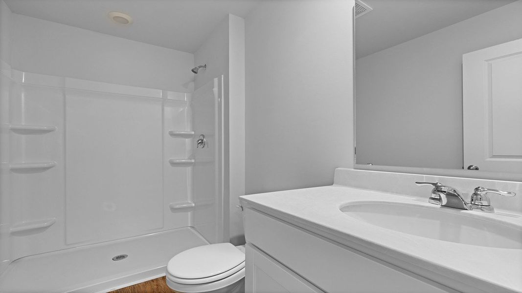 Furnished interior view inside a new home in Pine Hills at Cane Bay, Summerville (Image 7). Furnished interior view inside a new home in Pine Hills at Cane Bay, Summerville (Image 7).