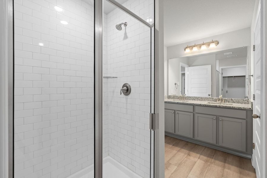 Furnished interior view inside a new home in Sunterra, Katy (Image 17).