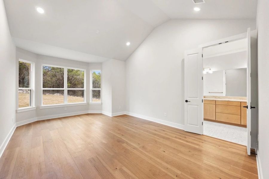 Spacious, unfurnished interior of a new home in The Estates at La Cima, San Marcos (Image 40).