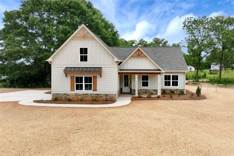 Front exterior of a new home in , Maysville, GA, highlighting curb appeal (Image 22).