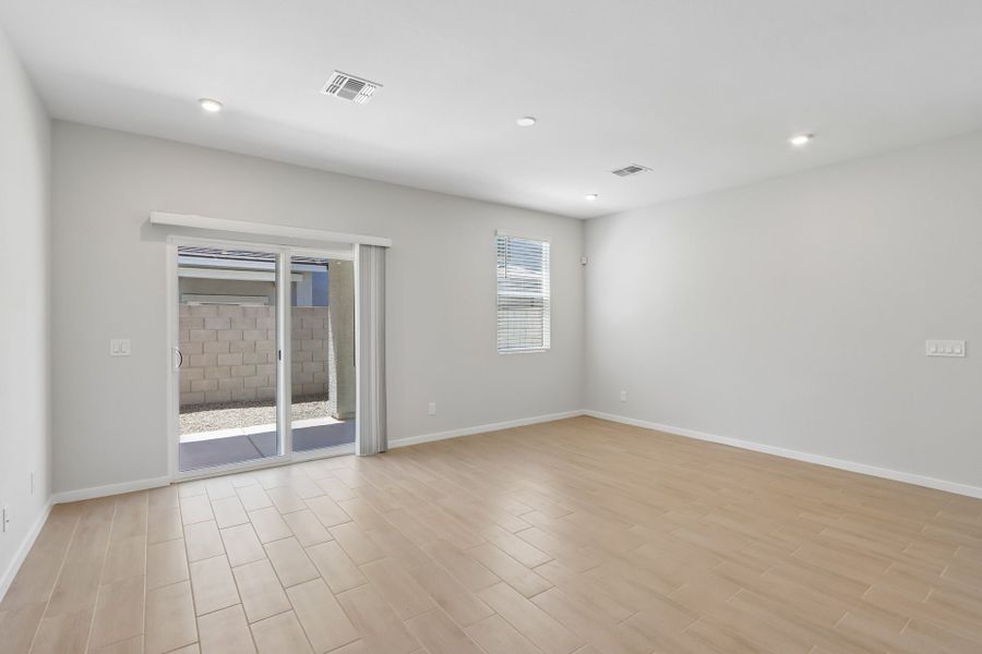 A room with a glass door.