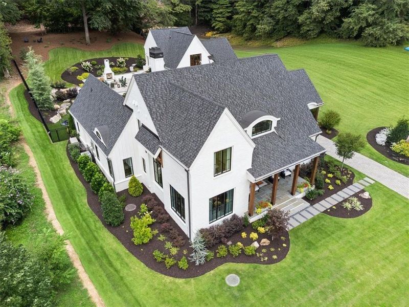 Front exterior of a new home in , Roswell, GA, highlighting curb appeal (Image 21).