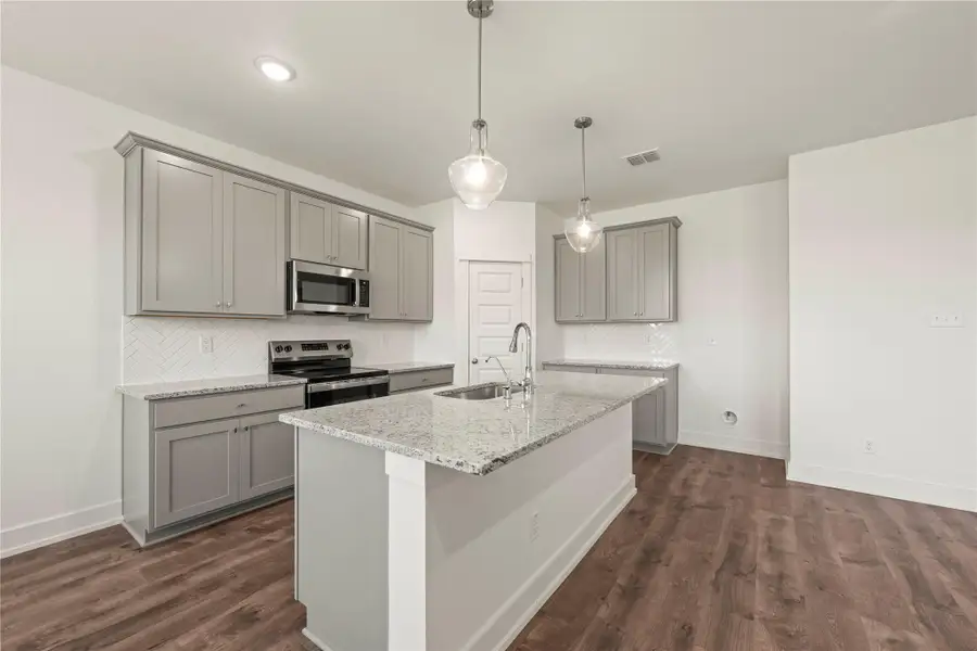 Furnished interior view inside a new home in Rancho San Gabriel, Georgetown (Image 9).