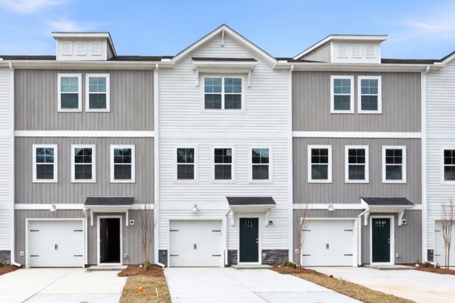 Front exterior of a new home in Liberty Village, Flemington, GA, highlighting curb appeal (Image 2). Front exterior of a new home in Liberty Village, Flemington, GA, highlighting curb appeal (Image 2).