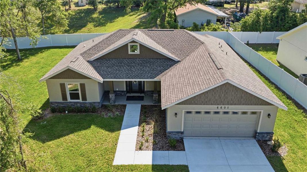 Front exterior of a new home in , Ocala, FL, highlighting curb appeal (Image 31).