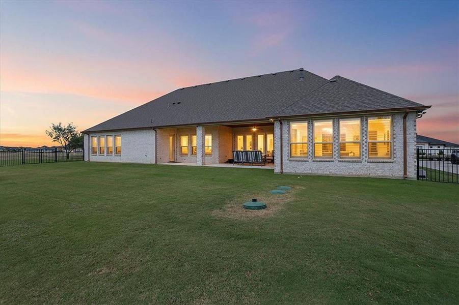Exterior details and patio area of a home in Bella Crossing, Fort Worth (Image 1).